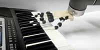 3-D Printed Robot Hand Plays the Piano